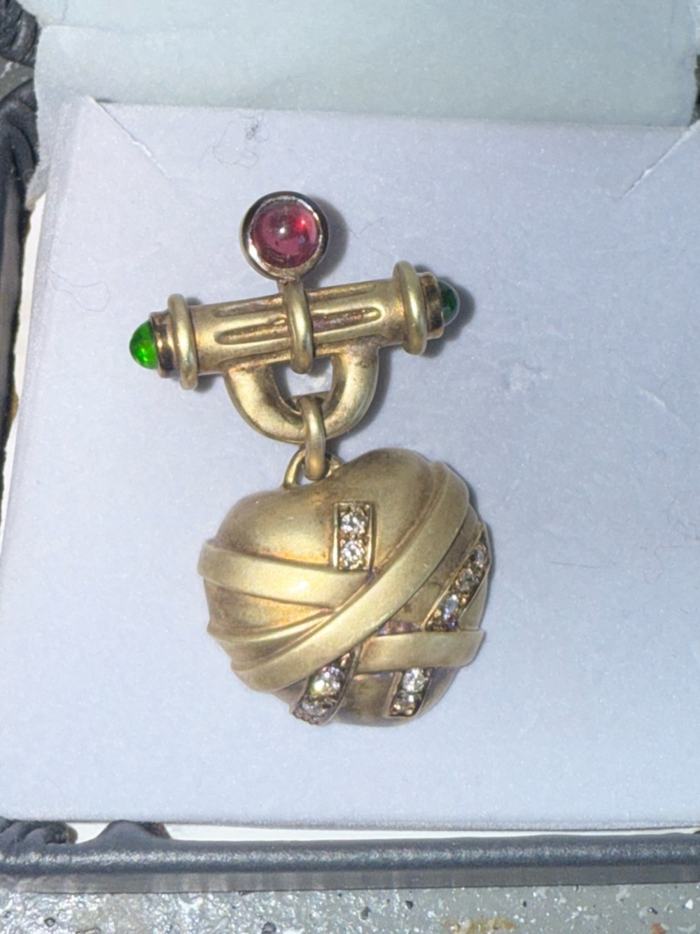 14k gold charm/pin with diamonds.
